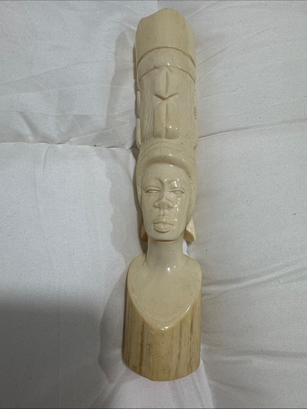 vintage carved figural sculpture animal tusk or bone section depicting an Africa